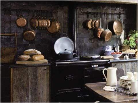 a stove top oven sitting inside of a kitchen 171