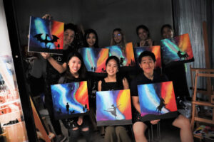 glow in the dark workshop kl art and bonding painting art class wine sip paint 1024x683 1